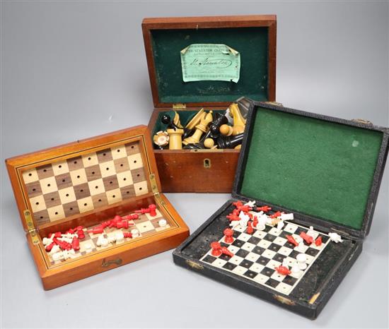 A Jaques Staunton pattern chess set and two travelling chess sets, all cased